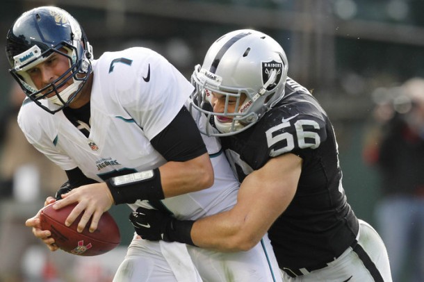 October 21, 2012; Oakland, CA, USA; Jacksonville Jaguars quarterback Chad Henne (7) is sacked by Oakland Raiders outside linebacker Miles Burris (56) in the third quarter at O.co Coliseum. The Raiders defeated the Jaguars 26-23 in overtime. Mandatory Credit: Cary Edmondson-US PRESSWIRE